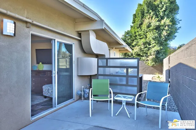 a view of two chairs in a room