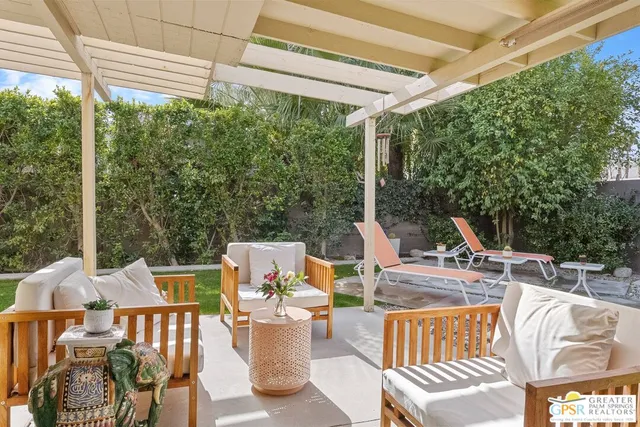 a view of a patio with swimming pool