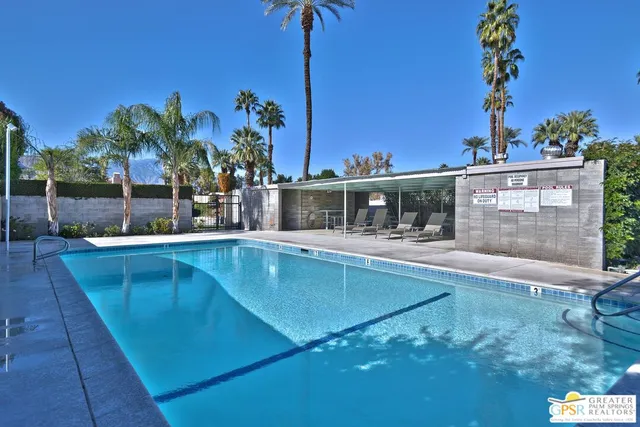 a view of a house with a swimming pool