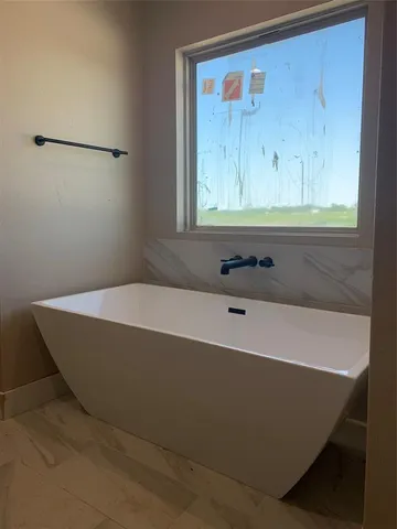 a bathroom with a bathtub