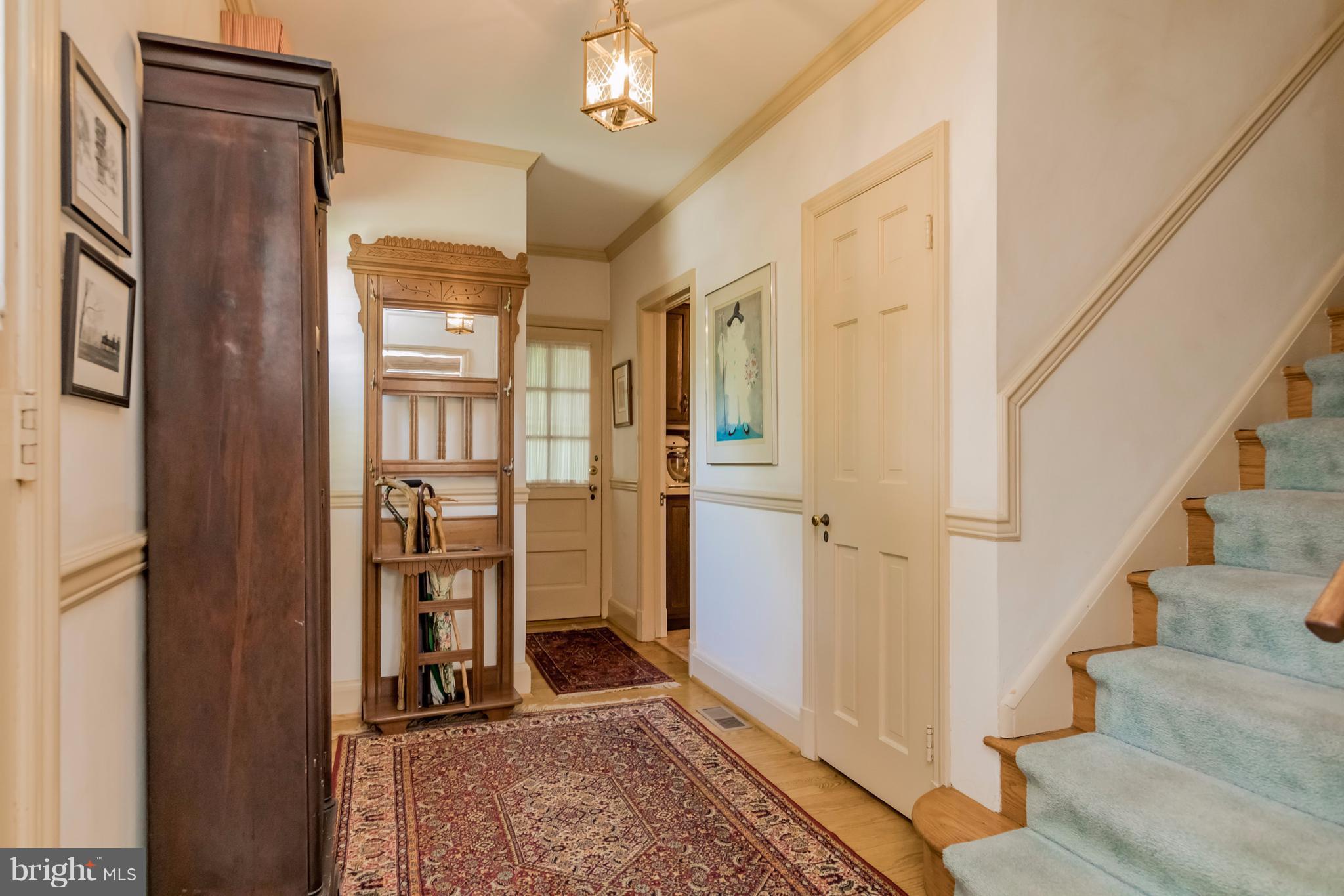 901 Kingston Road Baltimore, MD 21212 - Photo 3 of 27 a view of entryway with furniture and wooden floor