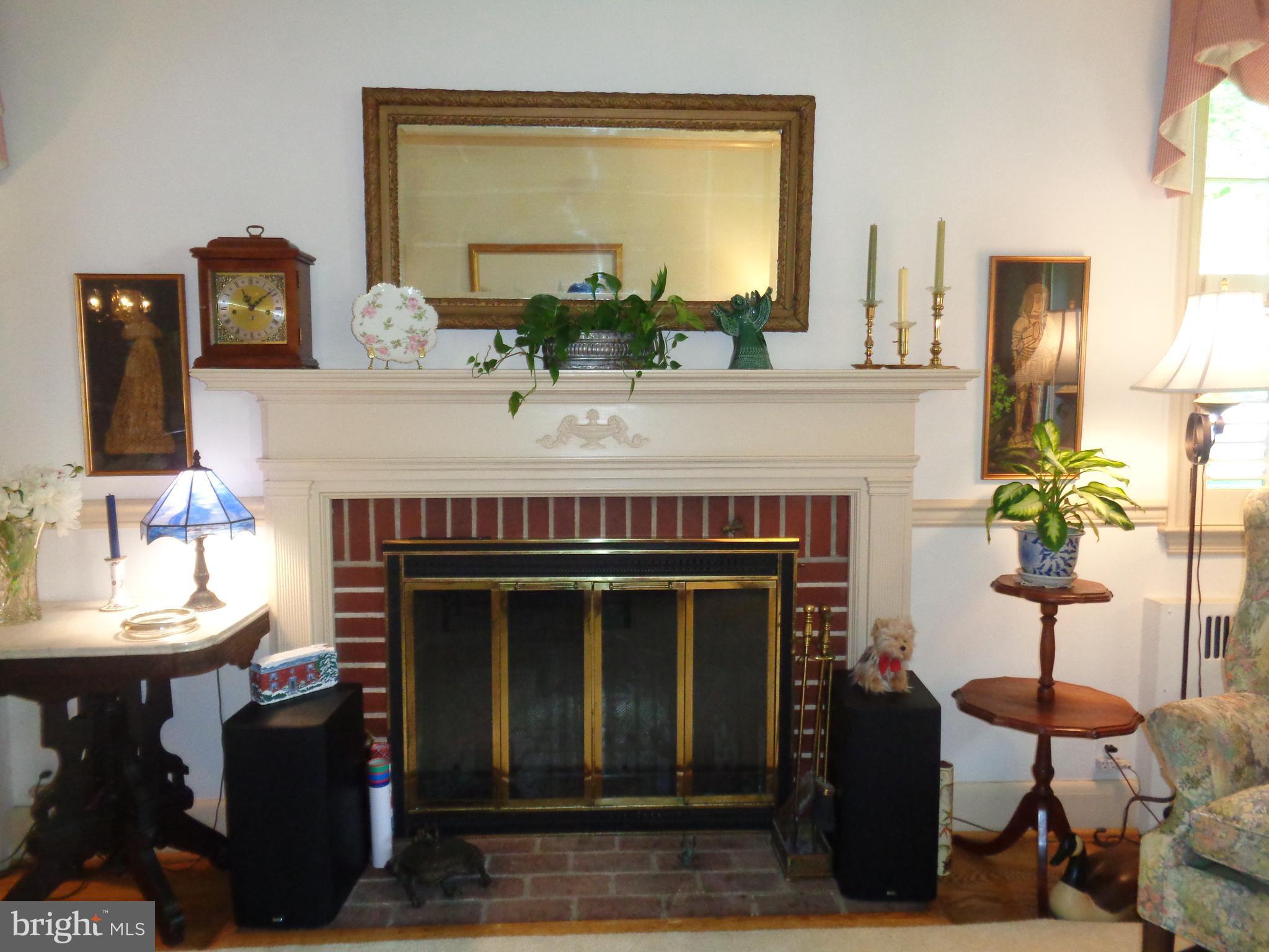 901 Kingston Road Baltimore, MD 21212 - Photo 7 of 27 a kitchen with a stove and a fireplace