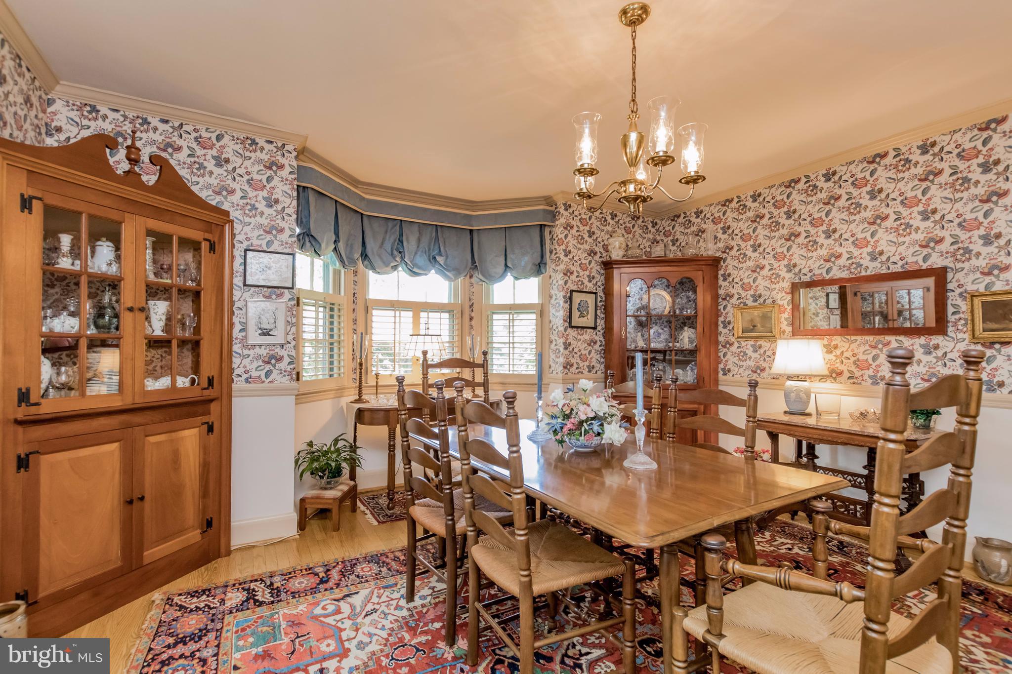 901 Kingston Road Baltimore, MD 21212 - Photo 8 of 27 a view of a dining room with furniture window and wooden floor