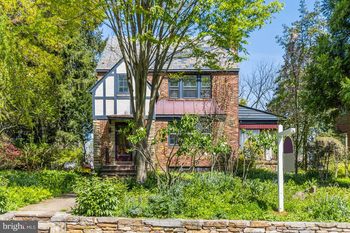 2418 Briarwood Road Baltimore, MD 21209 - Photo 49 of 55 a front view of a house with plants and trees