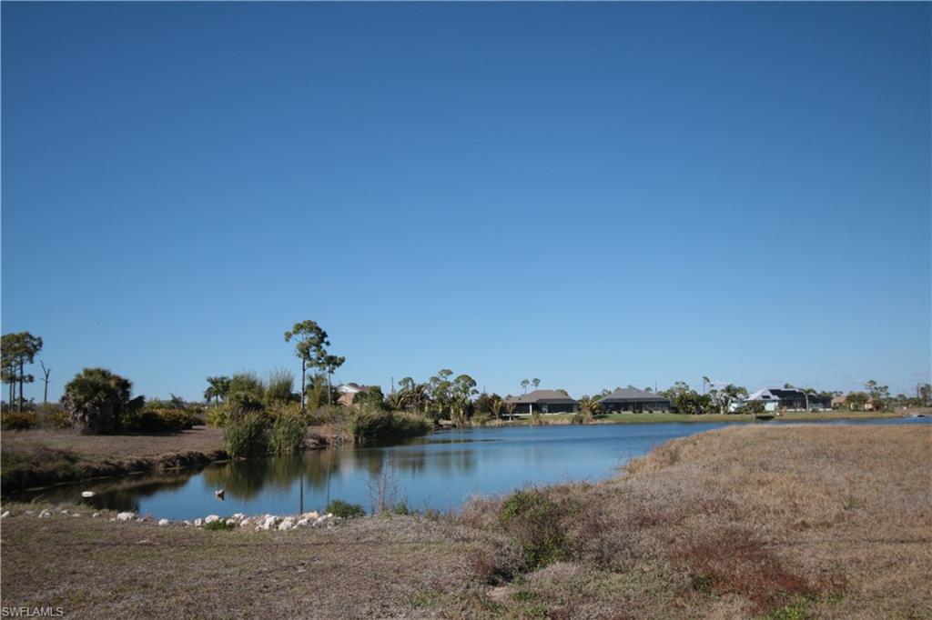 26 Harness Road Placida, FL 33946 - Photo 11 of 26 a view of a lake with houses