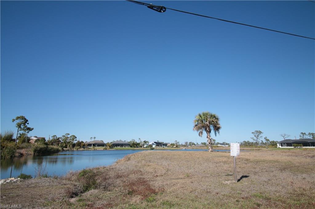 26 Harness Road Placida, FL 33946 - Photo 12 of 26 a view of a lake with houses in the background