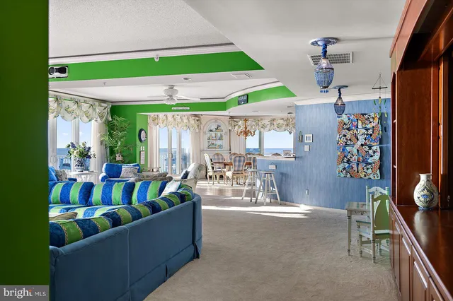 a kitchen with stainless steel appliances granite countertop a refrigerator and a stove