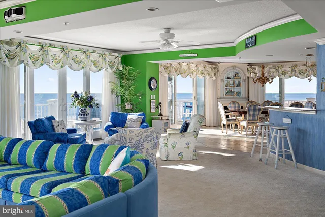 a view of a dining room with furniture and chandelier kitchen