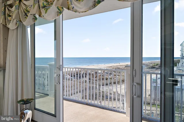a spacious bathroom with a sink and a large mirror