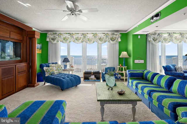 a bathroom with a granite countertop sink mirror vanity and toilet