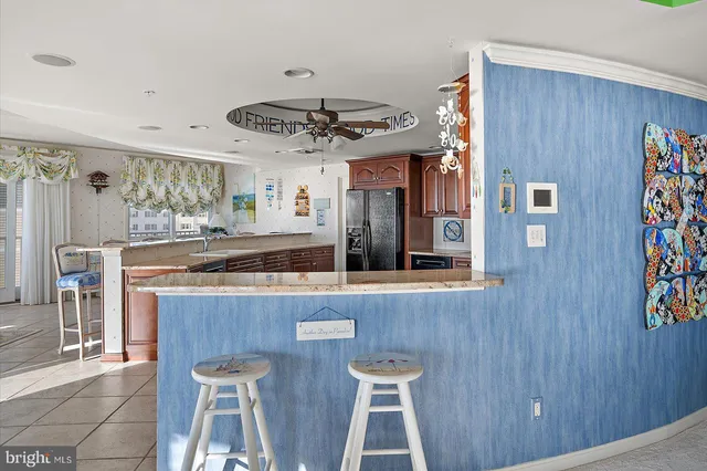 a bedroom that has a bed and a chair in it