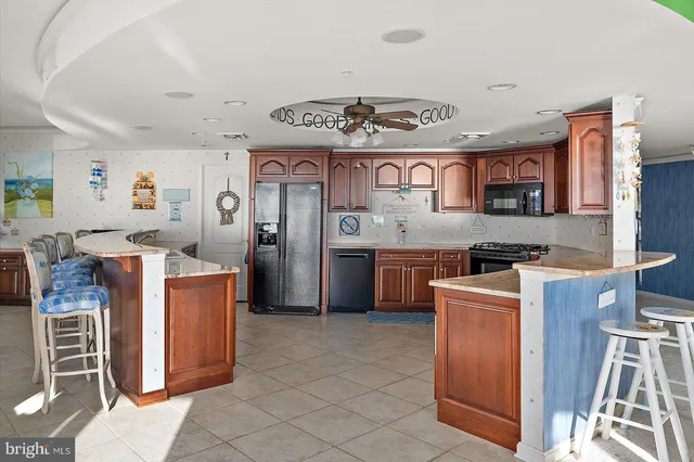 a bedroom with two beds and a window