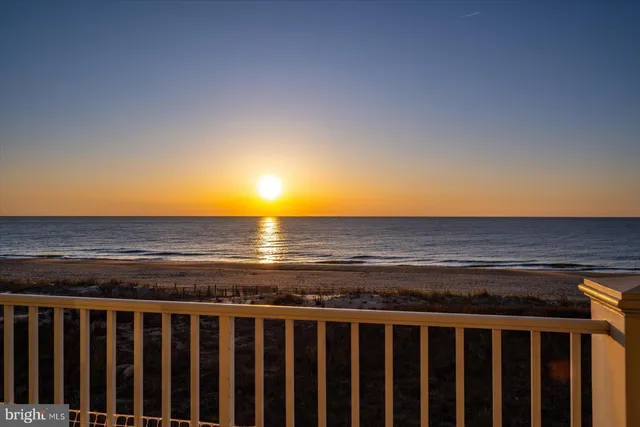 a view of a balcony with chairs