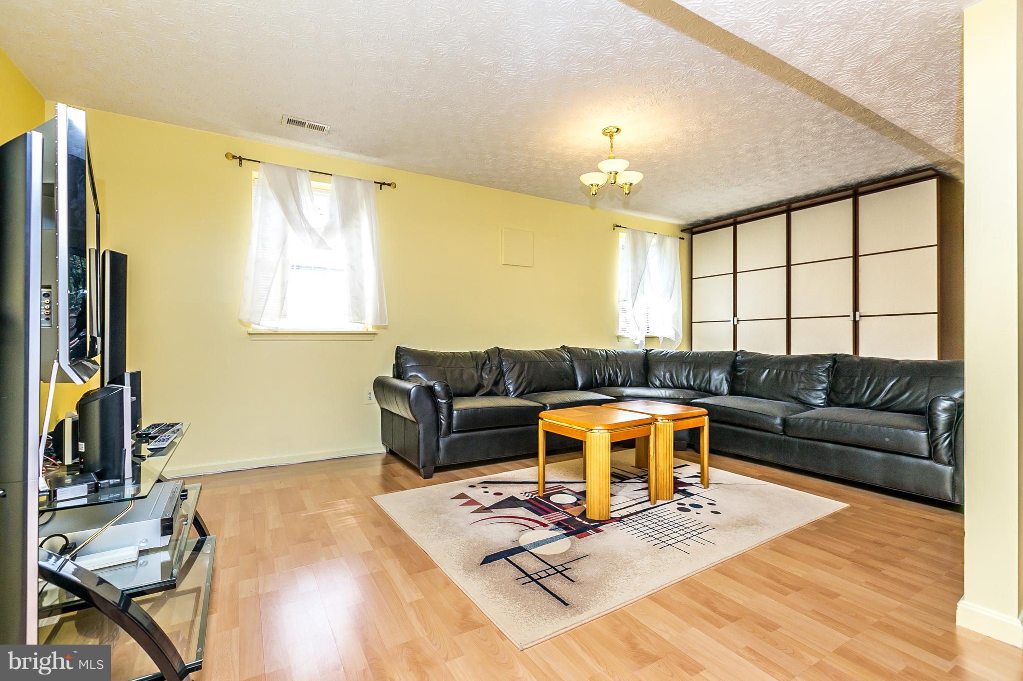 27 Timber Grove Road Owings Mills, MD 21117 - Photo 19 of 30 Family Room lower level with walkout