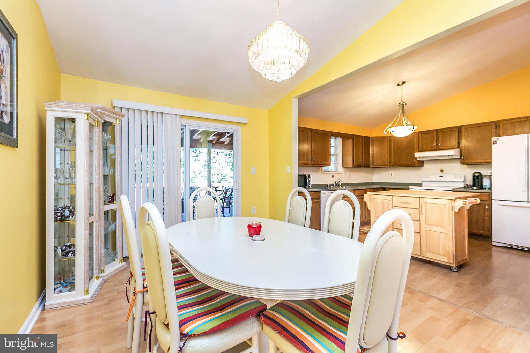 27 Timber Grove Road Owings Mills, MD 21117 - Photo 9 of 30 Kitchen, dining and living room with deck access