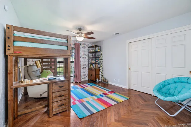 a room with furniture and gym equipment