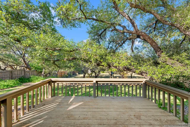 a view of a wooden fence