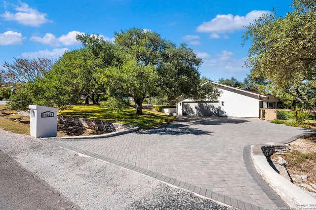a view of a street with some trees