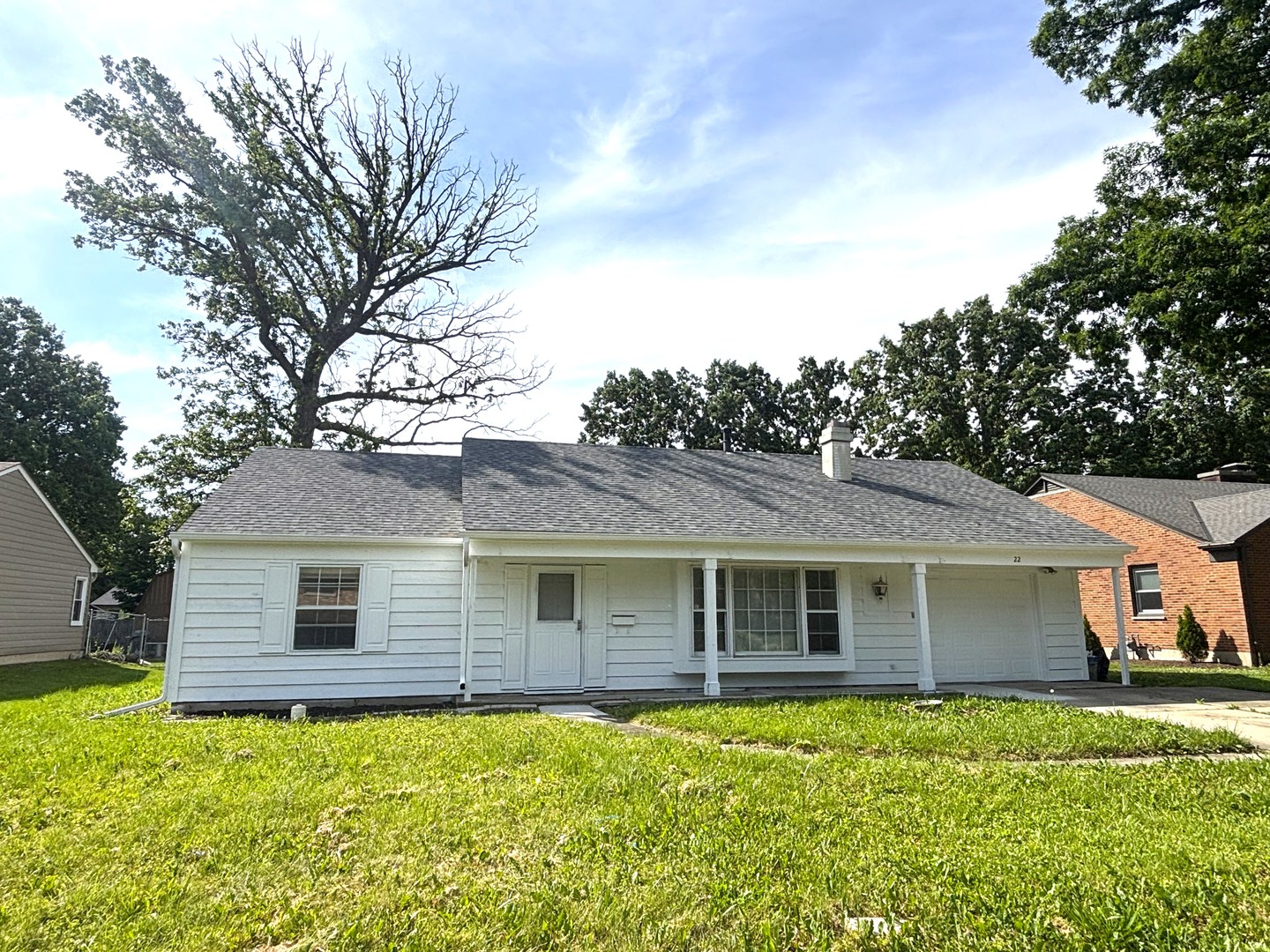 22 Guilford Road Montgomery, IL 60538 - Photo 1 of 14 a front view of a house with a garden