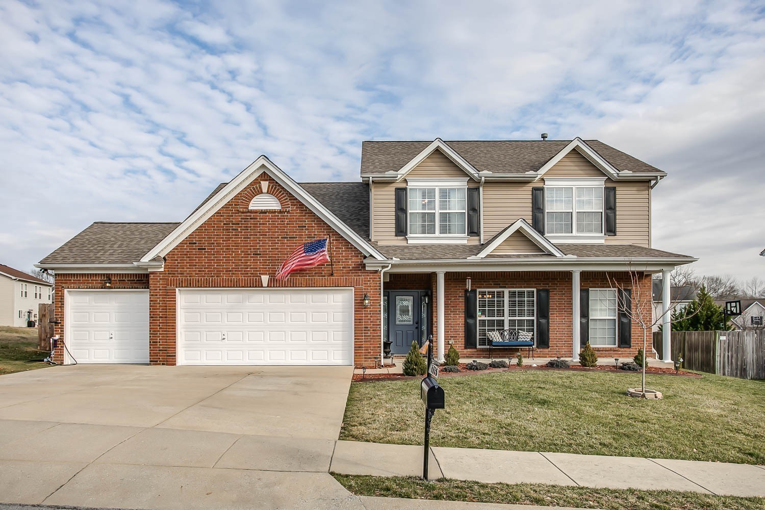1715 Emma Circle Spring Hill, TN 37174 - Photo 1 of 23 a front view of a house with a yard and garage