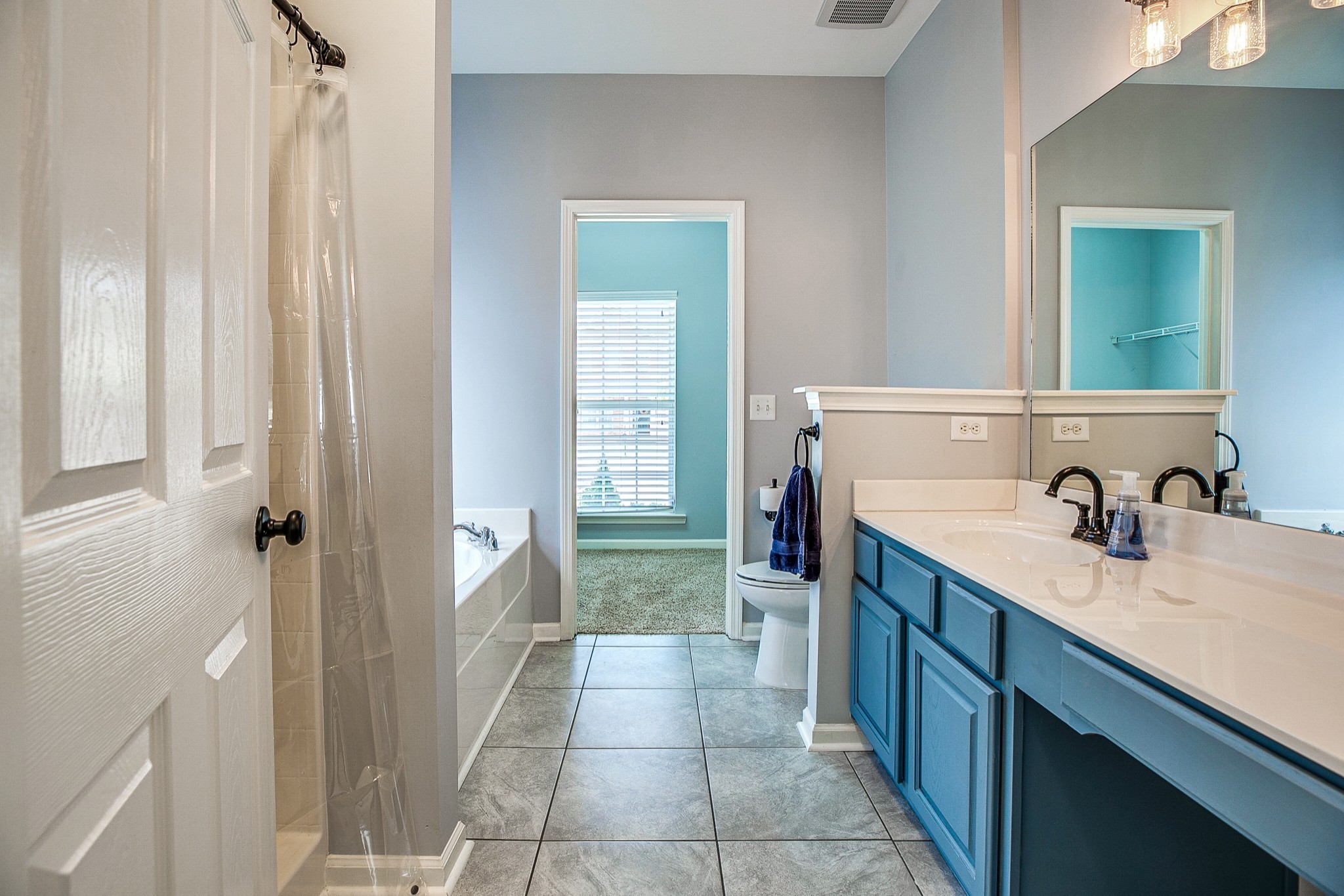 1715 Emma Circle Spring Hill, TN 37174 - Photo 13 of 23 a bathroom with a sink a toilet and shower