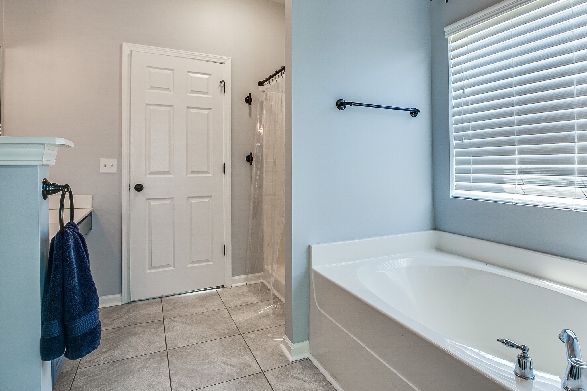 1715 Emma Circle Spring Hill, TN 37174 - Photo 14 of 23 a bathroom with a bathtub and a shower