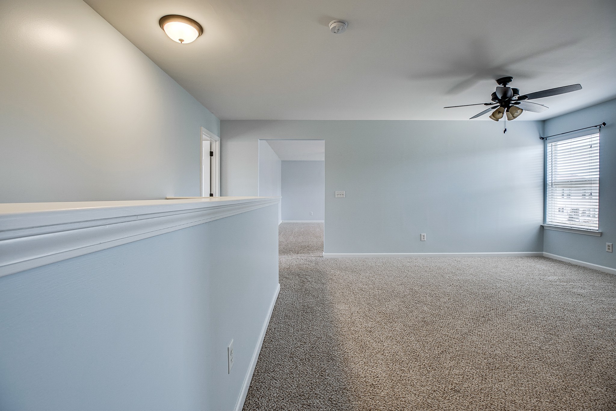 1715 Emma Circle Spring Hill, TN 37174 - Photo 20 of 23 a view of a livingroom with a ceiling fan and window