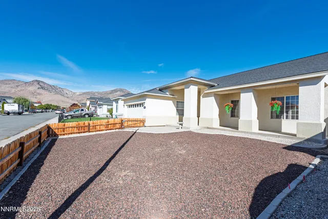 a view of swimming pool with outdoor seating
