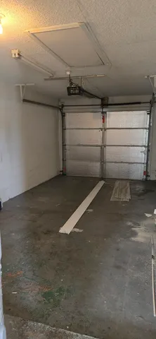 a view of a room with an empty space