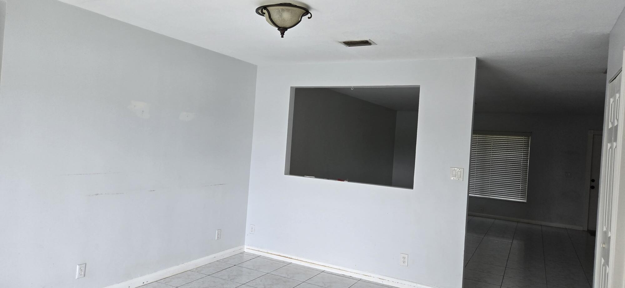 6158 Westfall Road Lake Worth, FL 33463 - Photo 7 of 24 a view of an entryway