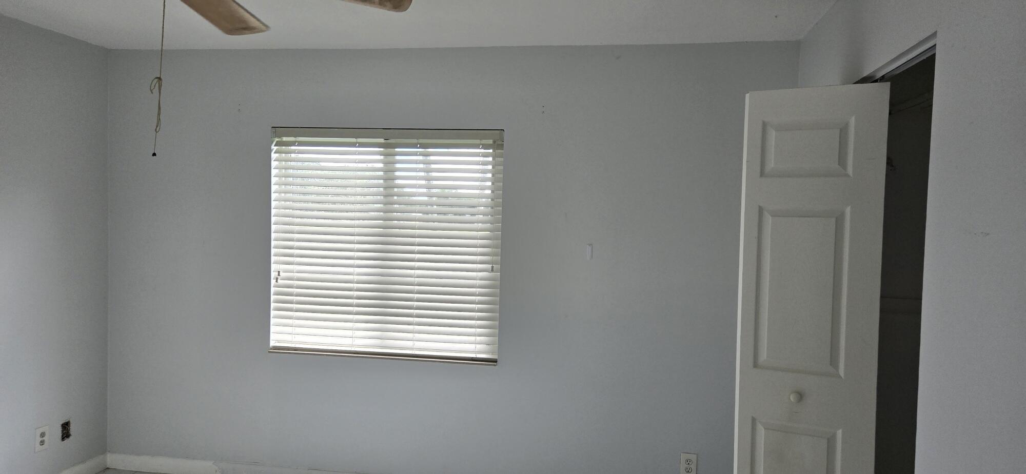 6158 Westfall Road Lake Worth, FL 33463 - Photo 9 of 24 a view of a window in a room