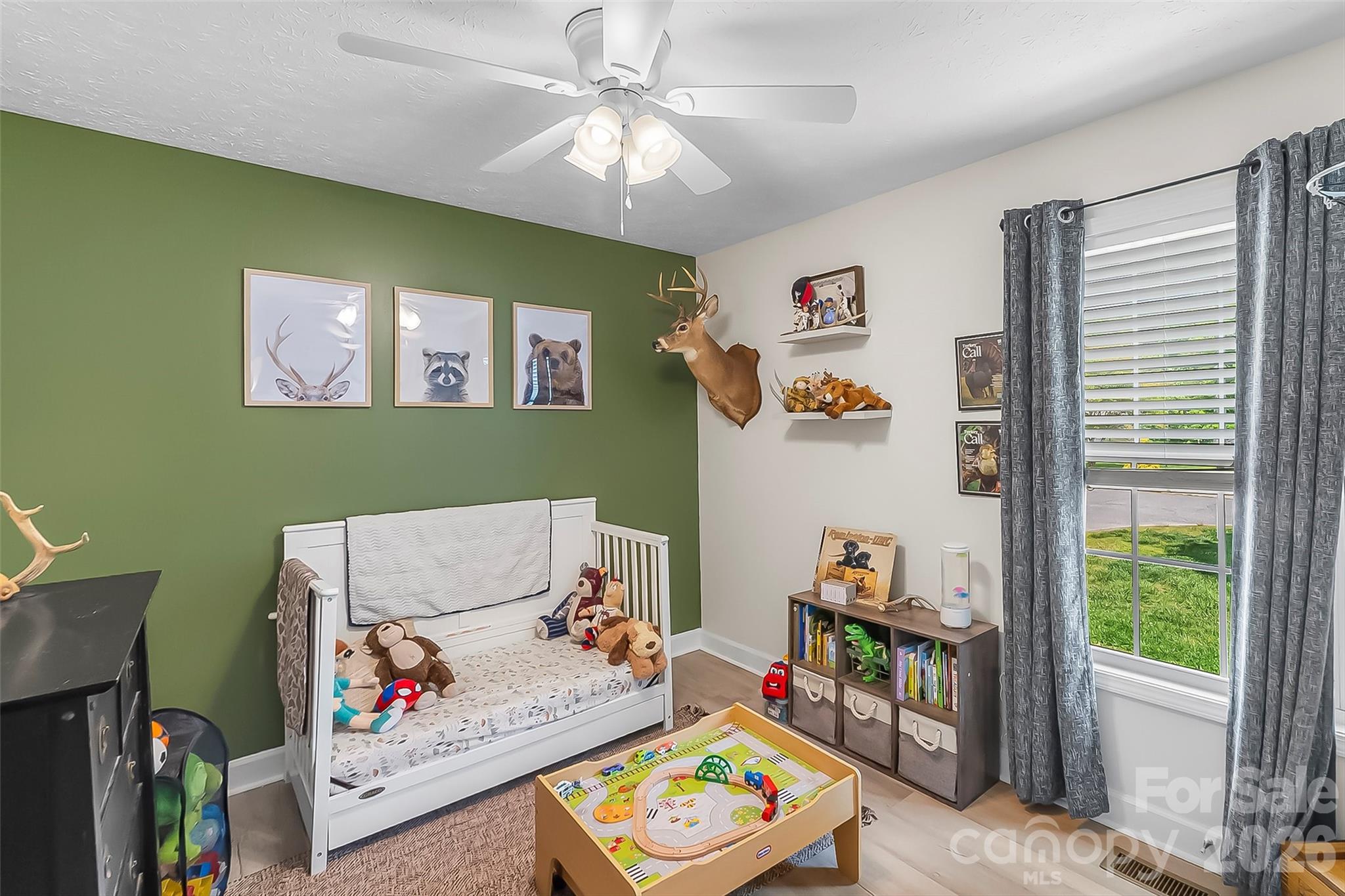 1498 Salem Road Morganton, NC 28655 - Photo 23 of 32 a living room with furniture and a window