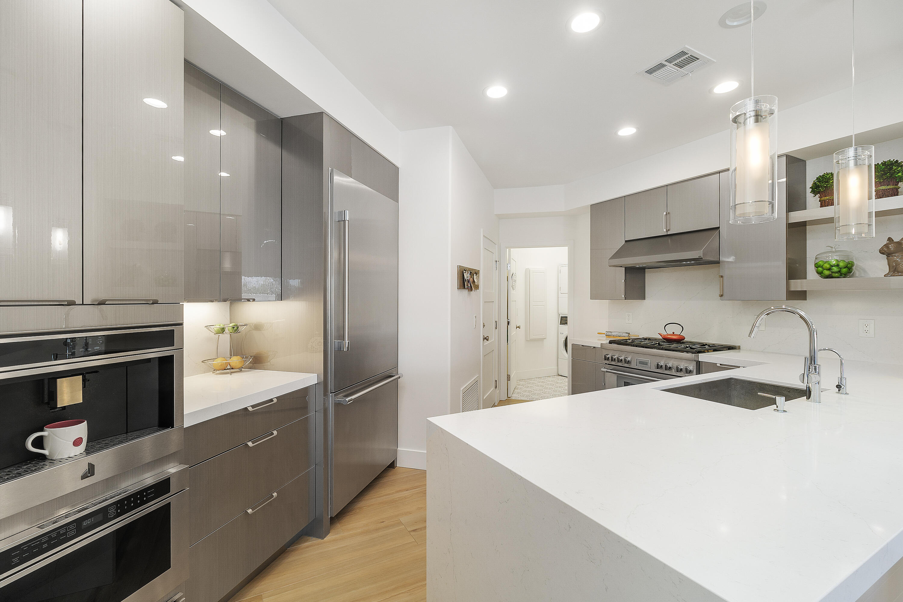 45703 Crosswater Street Indio, CA 92201 - Photo 11 of 41 a kitchen with stainless steel appliances a sink and a refrigerator