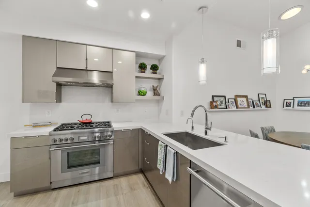 a bedroom with a bed and ceiling fan