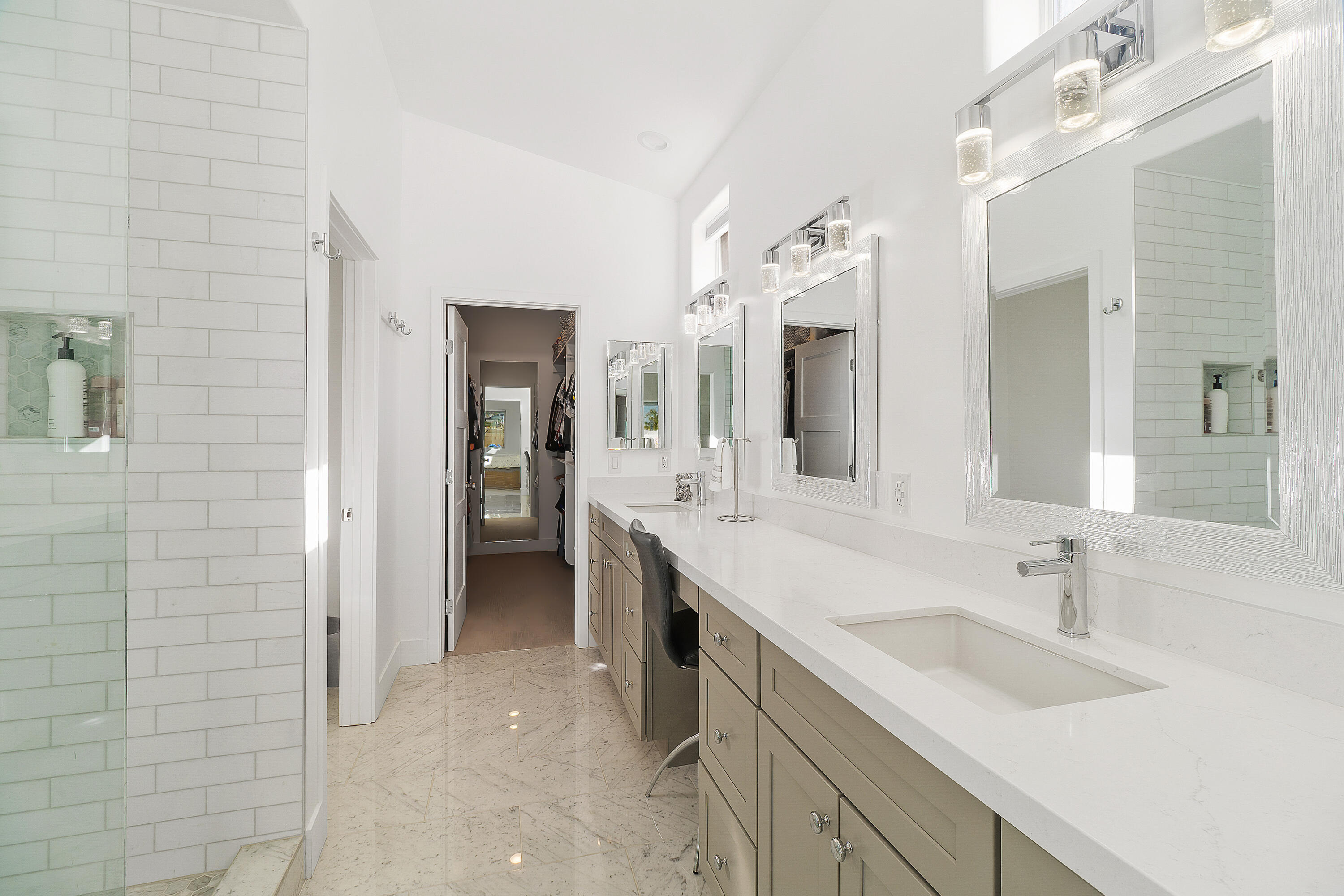 45703 Crosswater Street Indio, CA 92201 - Photo 17 of 41 a spacious bathroom with a double vanity sink and a mirror