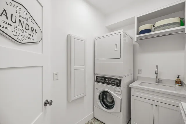 a view of a patio with a table chairs and a table