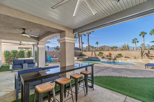 a view of a house with swimming pool