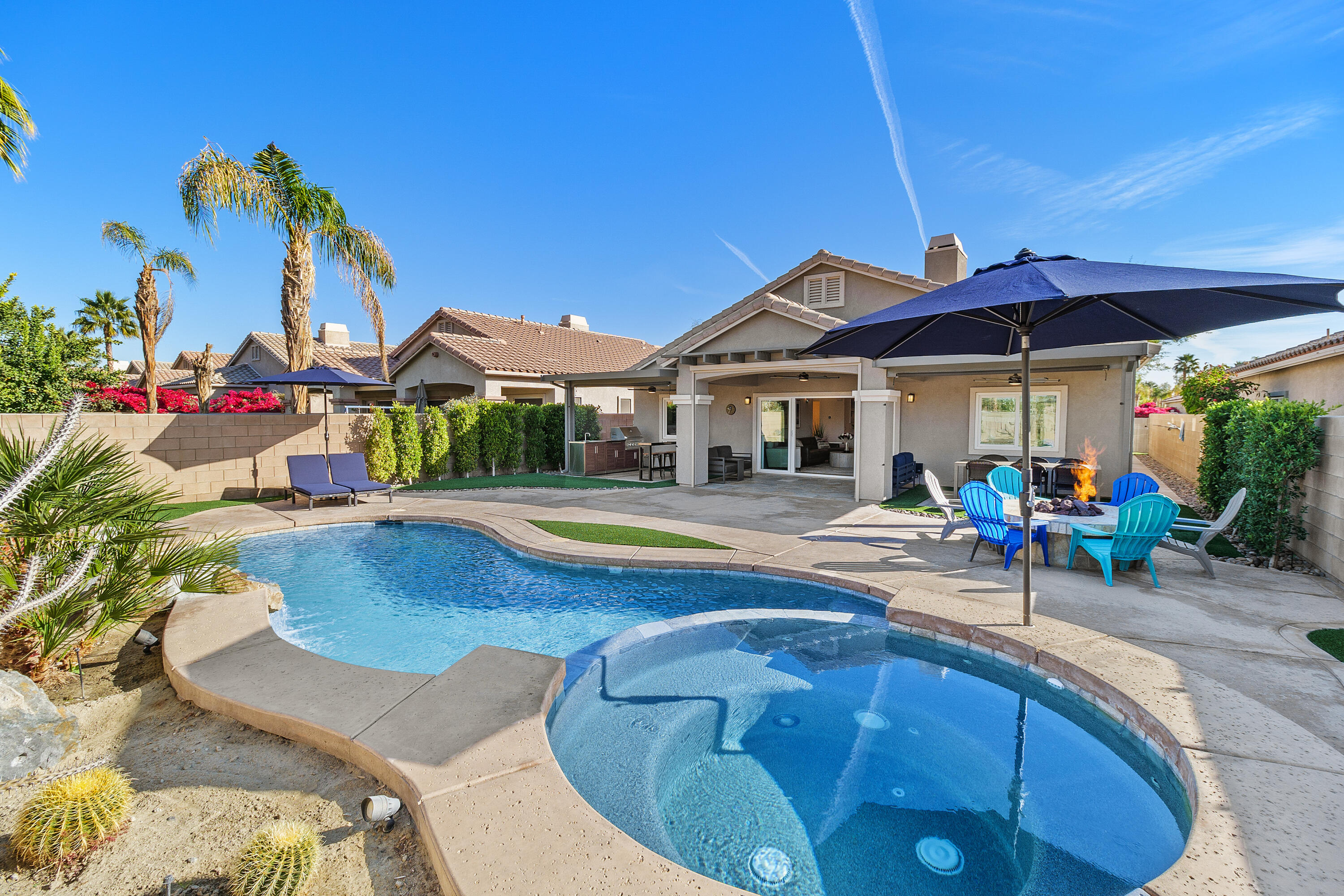 45703 Crosswater Street Indio, CA 92201 - Photo 32 of 41 a view of a house with swimming pool