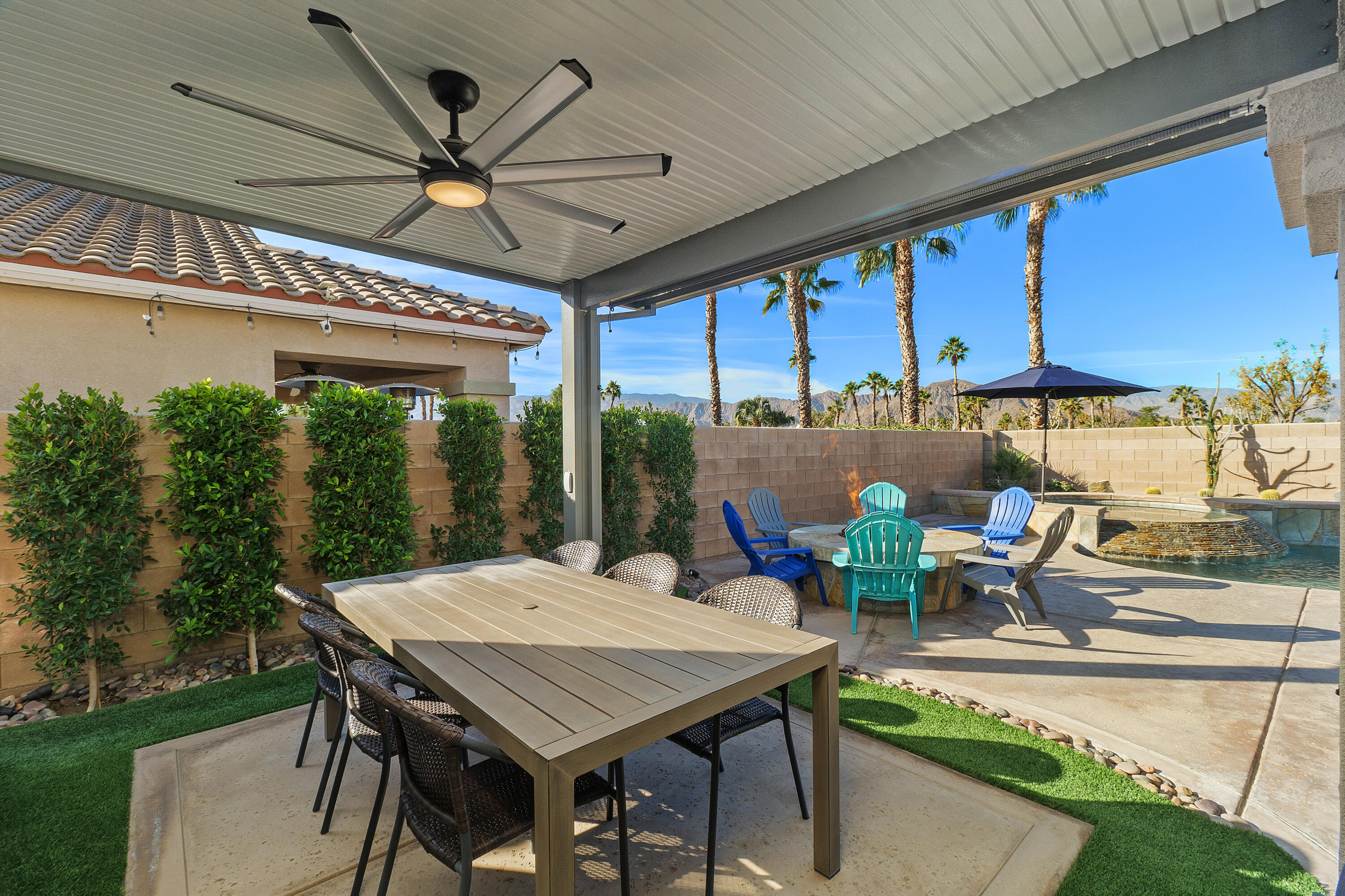 45703 Crosswater Street Indio, CA 92201 - Photo 33 of 41 a view of a patio with a table chairs and a table