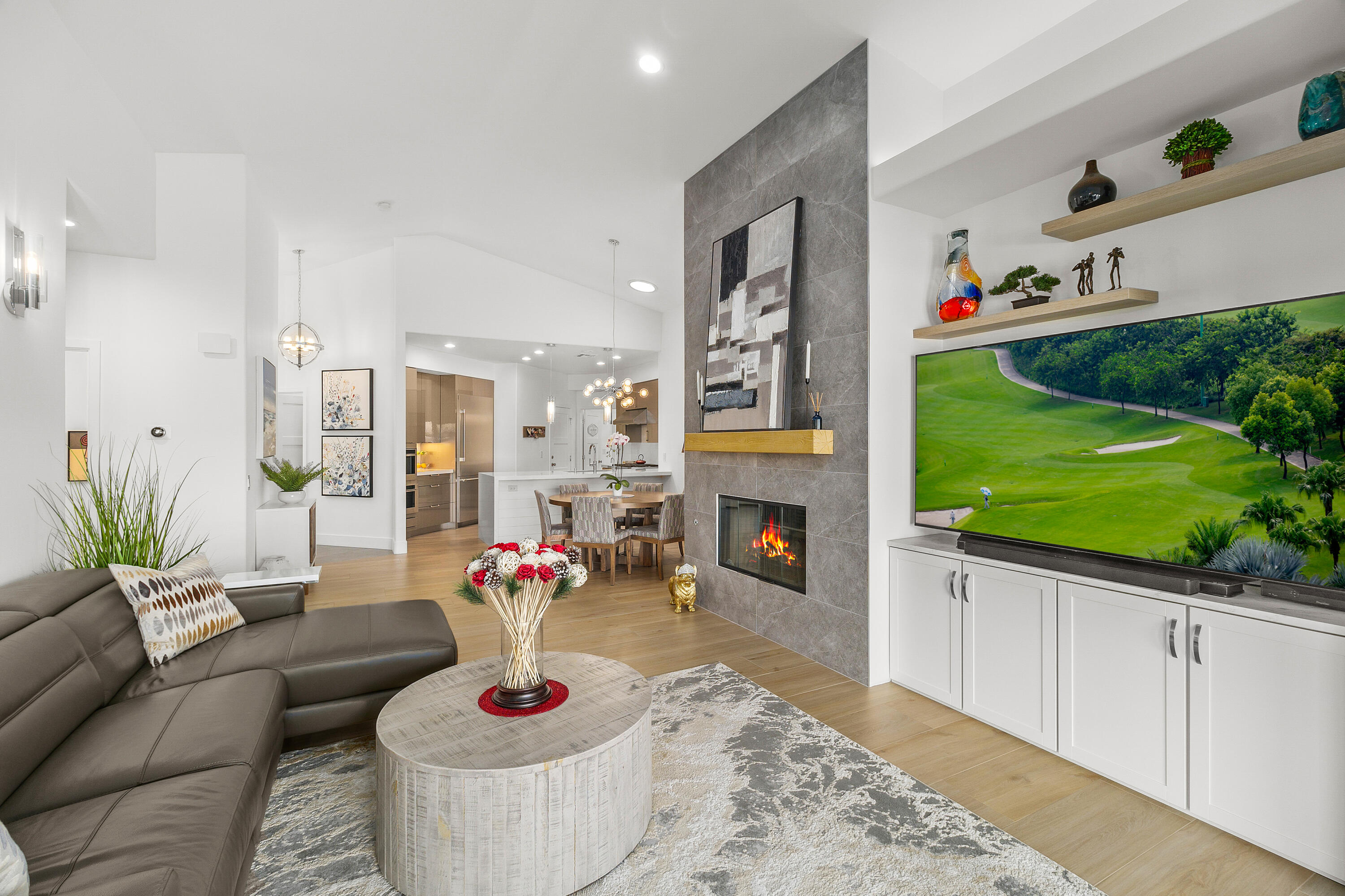 45703 Crosswater Street Indio, CA 92201 - Photo 7 of 41 a living room with furniture fireplace and garden view