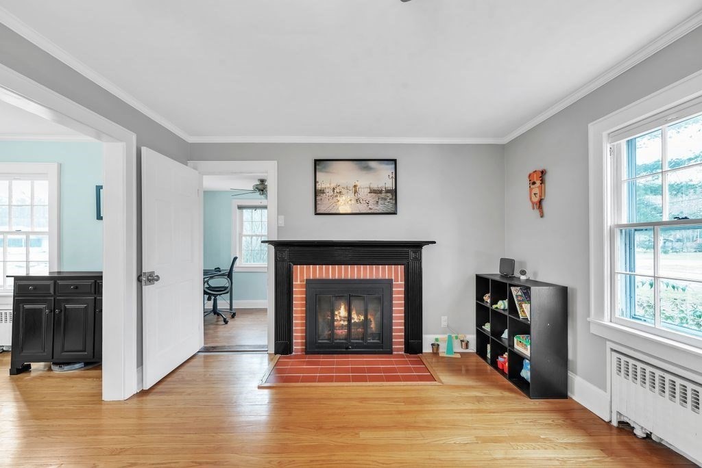 106 Granville Road Westfield, MA 01085 - Photo 11 of 42 a living room with furniture and a fireplace