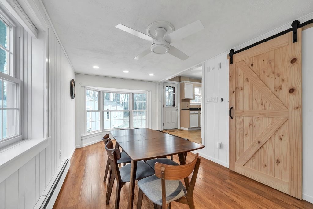 106 Granville Road Westfield, MA 01085 - Photo 16 of 42 a view of a dining room with furniture window and wooden floor