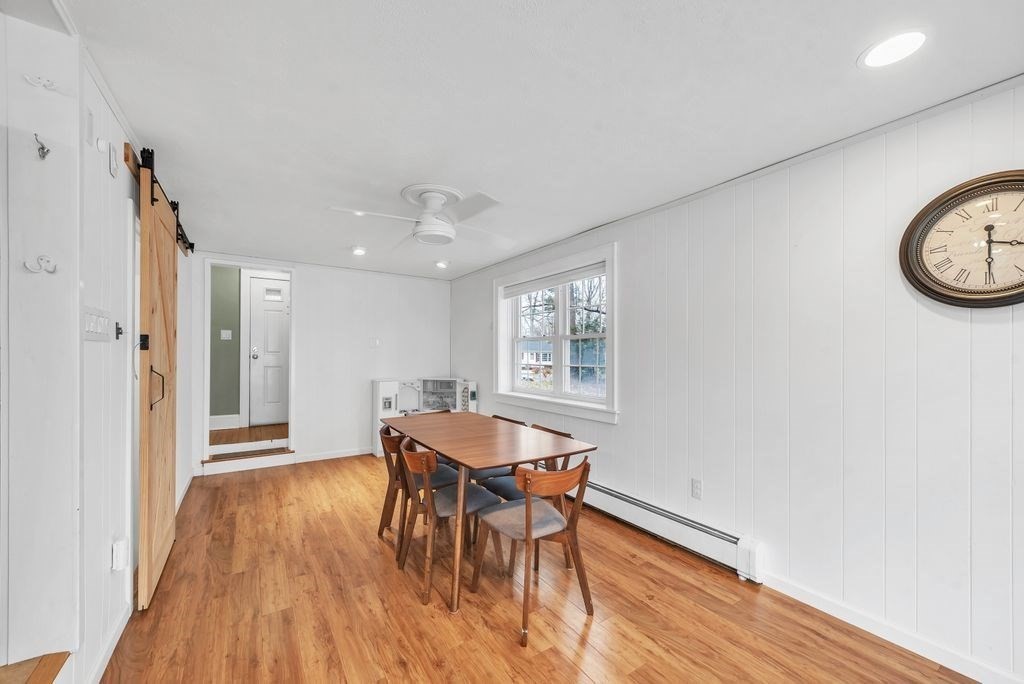 106 Granville Road Westfield, MA 01085 - Photo 18 of 42 a view of a dining room with furniture and wooden floor
