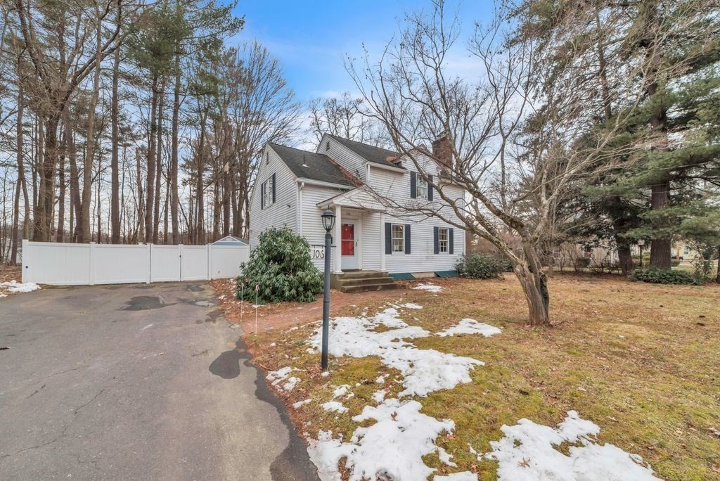 106 Granville Road Westfield, MA 01085 - Photo 3 of 42 a white house that has a tree in front of it