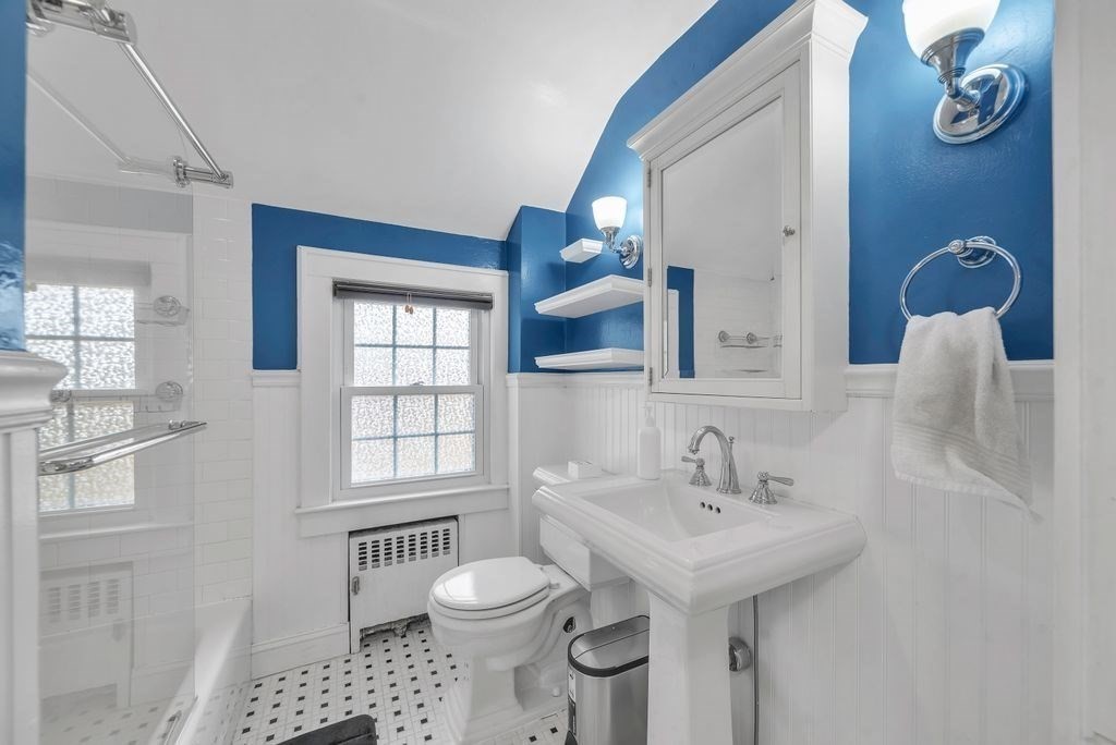 106 Granville Road Westfield, MA 01085 - Photo 31 of 42 a bathroom with a sink a toilet and window