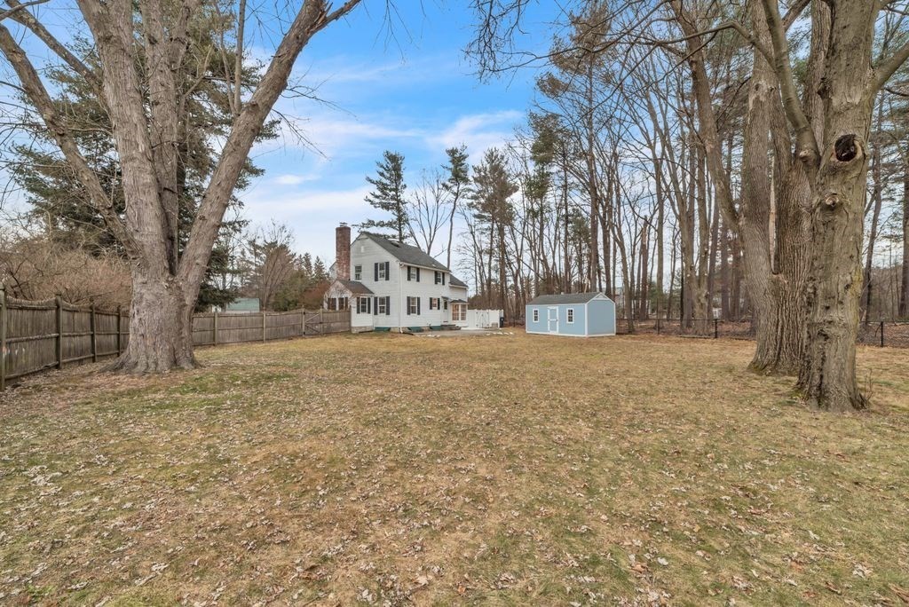 106 Granville Road Westfield, MA 01085 - Photo 8 of 42 a house with trees in front of it