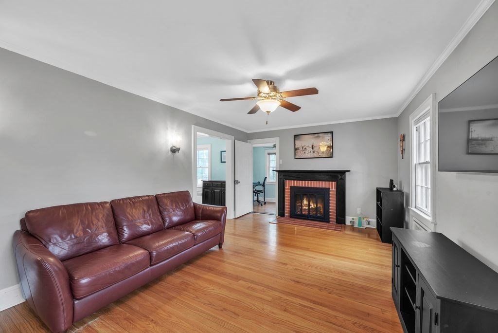 106 Granville Road Westfield, MA 01085 - Photo 9 of 42 a living room with furniture and a fireplace