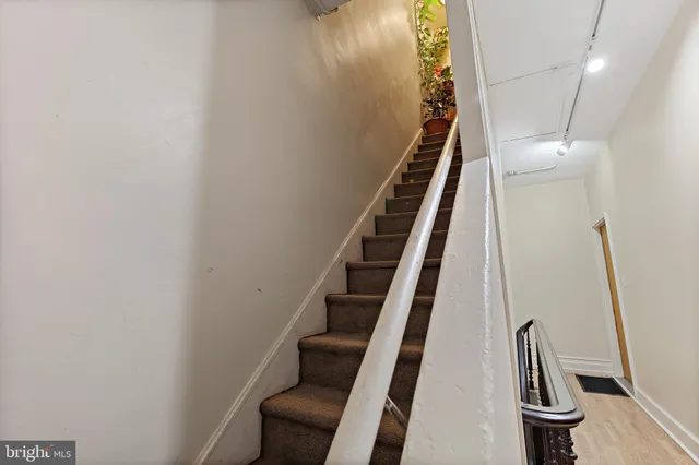 a view of a kitchen and utility room