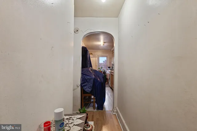 a spacious bedroom with a bed and furniture