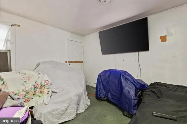 view of a wall with a clock on the wall